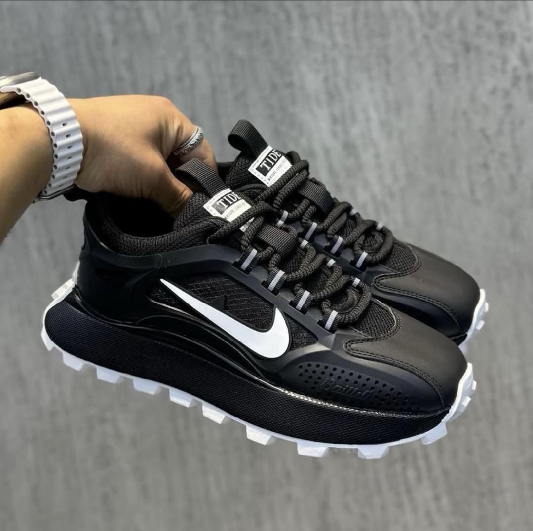 Sneakers and loafers for sale in Nigeria, featuring the Nike swoosh and a rugged sole.